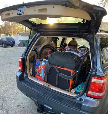 We always collect stuff throughout the trip Rear of SUV full of bicycles and luggage after a long trip to San Diego, California