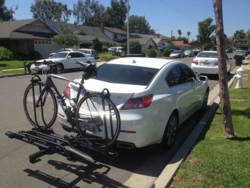 It was a nice, but heavy, rack Hitch mounted bike rack with bicycle on back of sedan