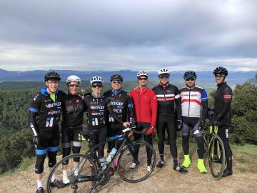 Group photo of several cyclists in Girona, Spain