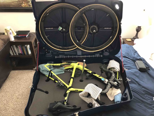 My Giant TCR inside my BikeBoxAlan case, with additional rags and padding on top of areas that need additional support like the brake hoods Giant TCR inside BikeBoxAlan case step 2 with additional rags and padding