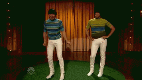 Will Ferrell and Jimmy Fallon doing a dance in white pants