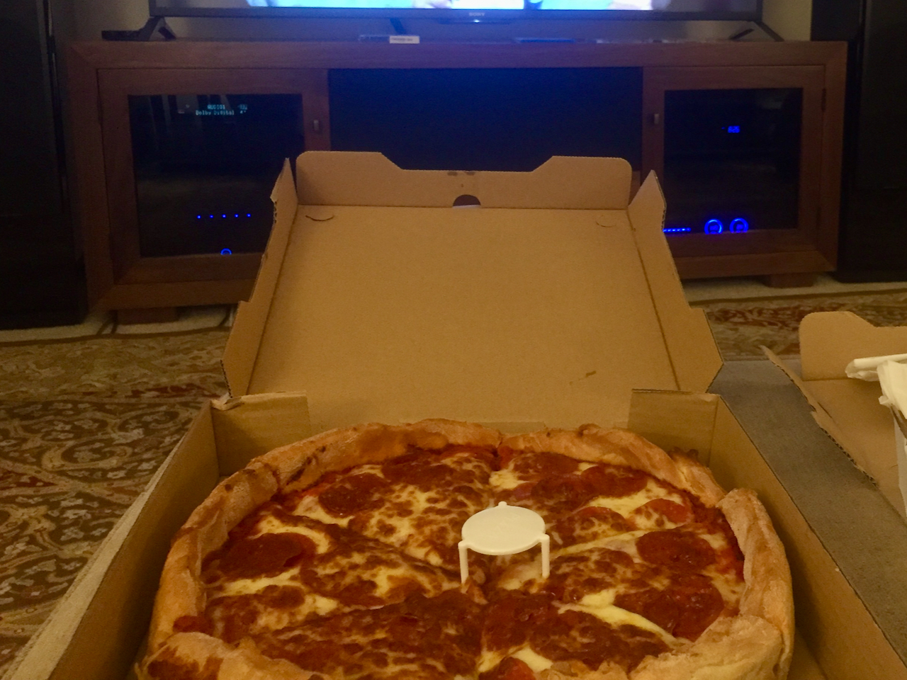 Pizza in front of a tv