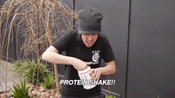 crazy kid drinking protein shake in unusual fashion