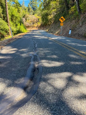 Rut in road on west Alpine road that caused two cyclists to crash in 2026.