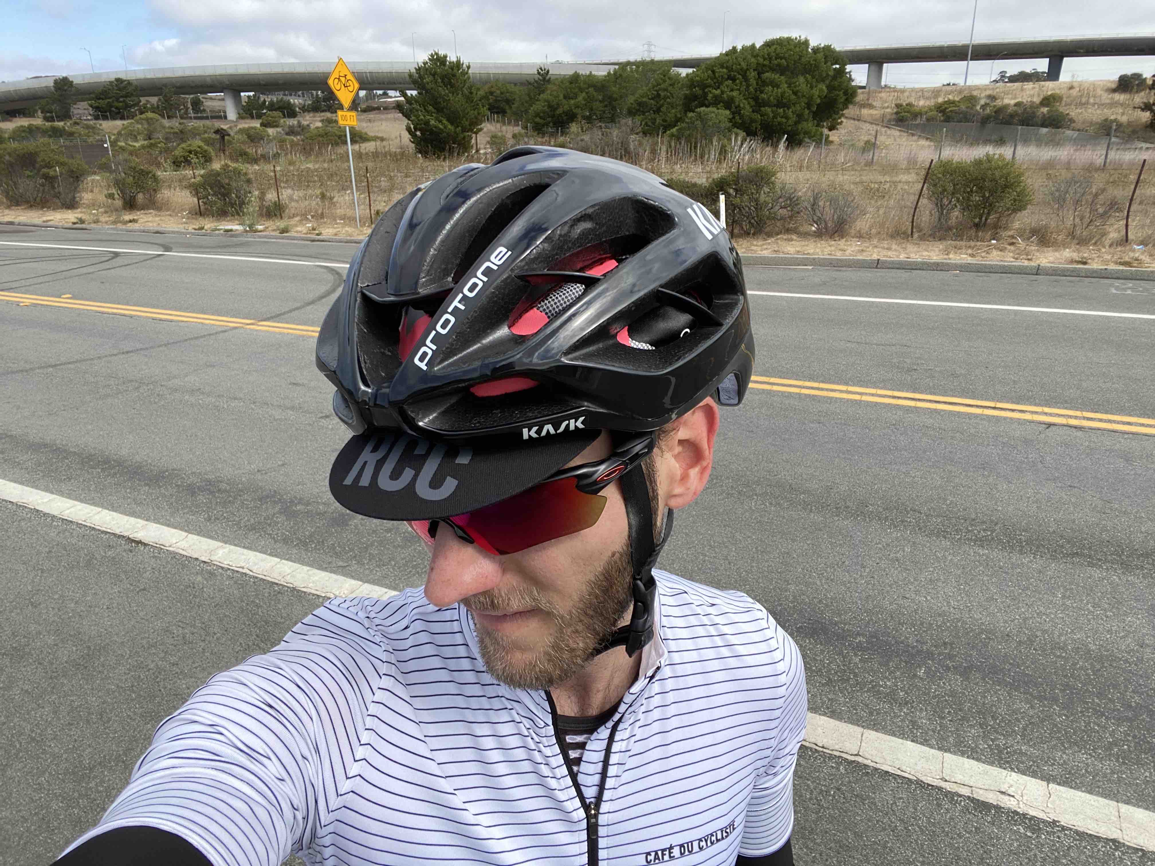 Bicycle rider wearing a Kask Protone bicycle helmet on Canada road