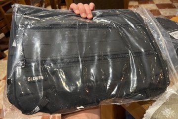 Unopened ScIcon Race Day Rain bicycle gear bag showing bottom pockets