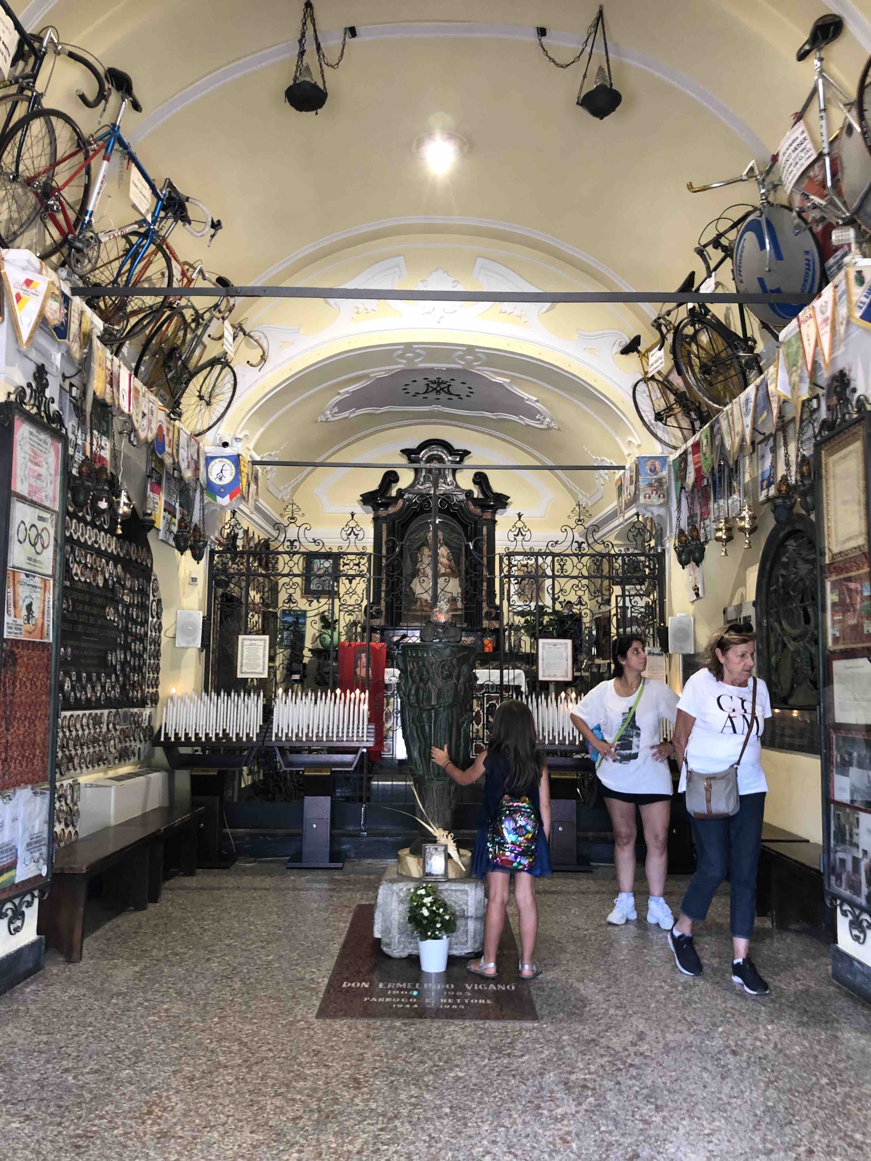 Inside the Madonna del Ghisallo church, a shrine to fallen professional cyclists