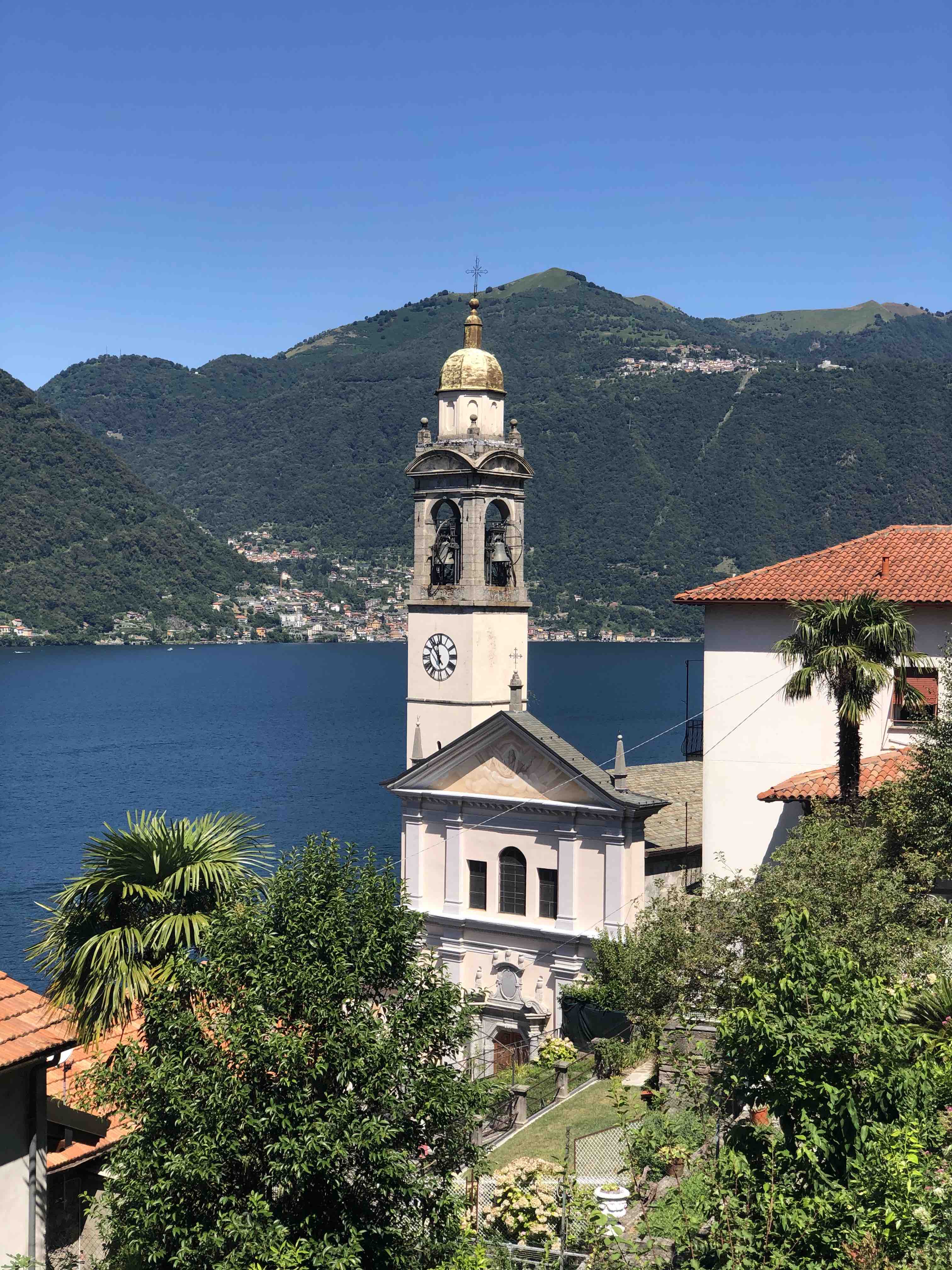 Bell tower on the coast of Lake Como in Italy