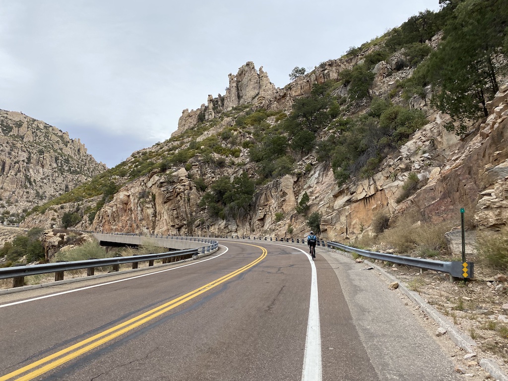Cyclist along road on Catalina Highway on the way up to Mount Lemmon in Tucson, Arizona