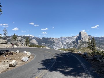 We both immediately stopped, as this just came up out of nowhere! View out over Half Dome from Glacier Point