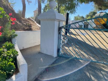 You know you're on the right track if you see this Gate near Mt. Lee Drive that connects the top of Mulholland Highway to the main path to the Hollywood Sign