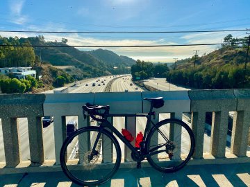 Overlooking south over the 101 freeway Bicycle on Mulholland overpass over the 101 freeway in Los Angeles, California