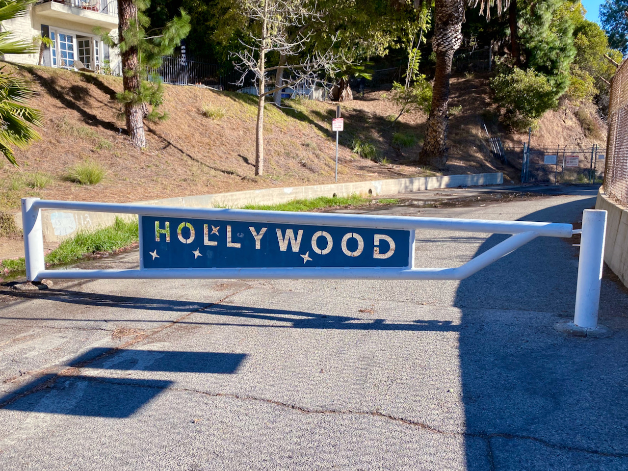 A gate saying Hollywood with stars on it near Tahoe drive on the north side of the Hollywood Reservoir