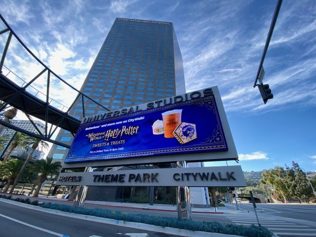 Digital sign for Universal Studios in Los Angeles in front of a Comcast / NBC building