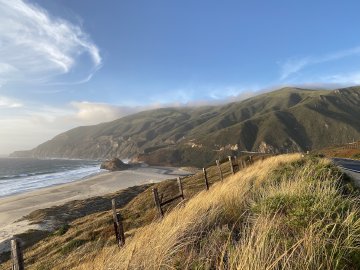Taken along highway 1 just south of Bixby Bridge. Just perfect. Golden grasses along highway 1 near Big Sur, California, with fogged over mountains in the background, just south of Bixby Bridge.