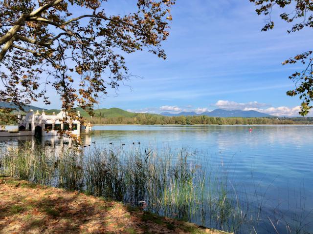 View over Lago Banolas, near Banyoles in Catalonia, Spain, with Pesquera Marimon in the foreground