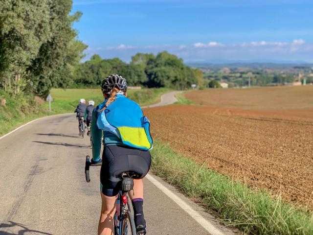Cyclist riding out near Camós on the way to Rocacorba, near Girona, Spain