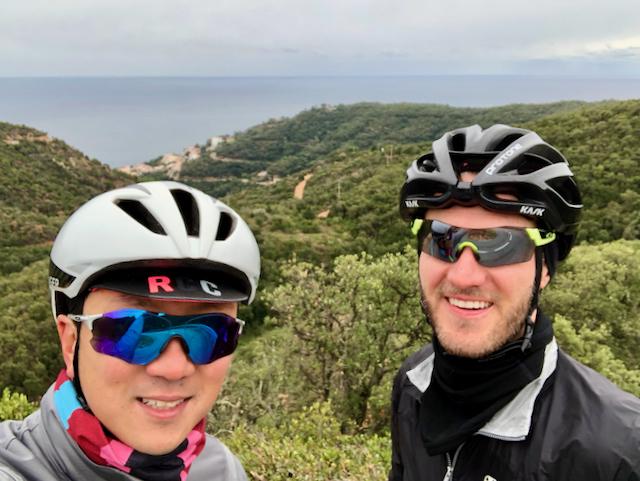 Two cyclists in a selfie overlooking the Costa Brava in Spain
