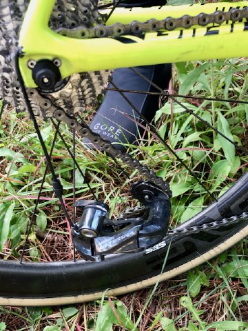 This could have been far worse than it actually was Shimano Ultegra derailleur hanging off of a bicycle chain having recently broken off its hanger