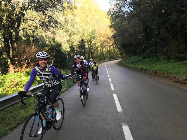 A group of cyclists on their way to Sant Hilari de Sacalm near Osor, Spain