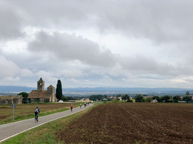 Cyclists admiring the view near Sant Vicenc in the Girona region of Spain