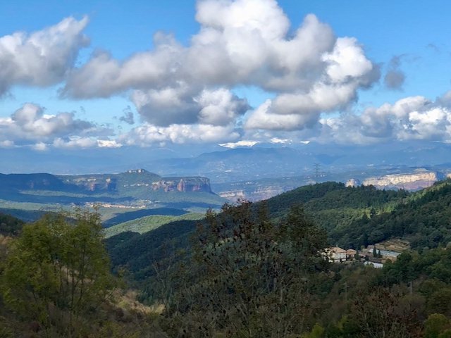 Near Vilanova de Sau in Spain, looking north towards white-faced cliffs and the Pyrenees mountains
