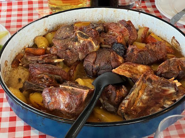 A traditional peka dish filled with veal, lamb, and vegetables