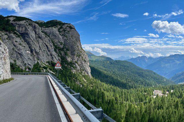 A view looking out over the valley from the top of Passo Falzarego towards Cernadoi and Andraz