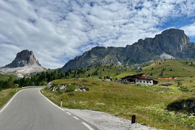 View of the limestone rock cliff faces near the top of the Passo Giau in the Italian Dolomites