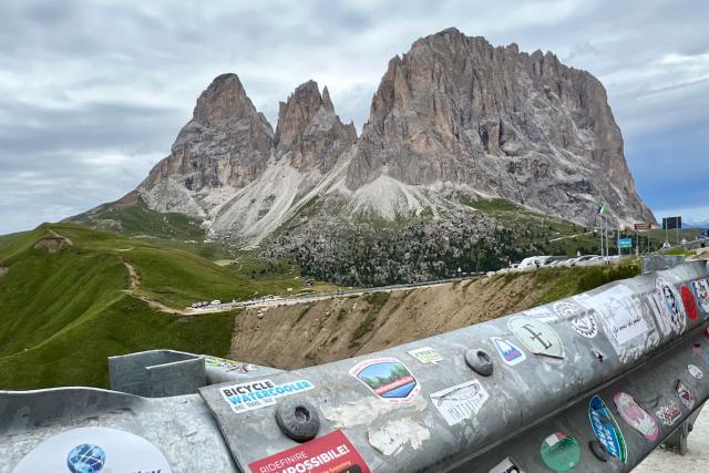 View of the railing at the top of the Passo Sella along the Sella Ronda loop in the Italian Dolomites