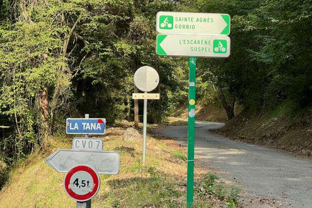 Road signs near La Tana in the forest between L'Escarène and Sainte Agnès, France