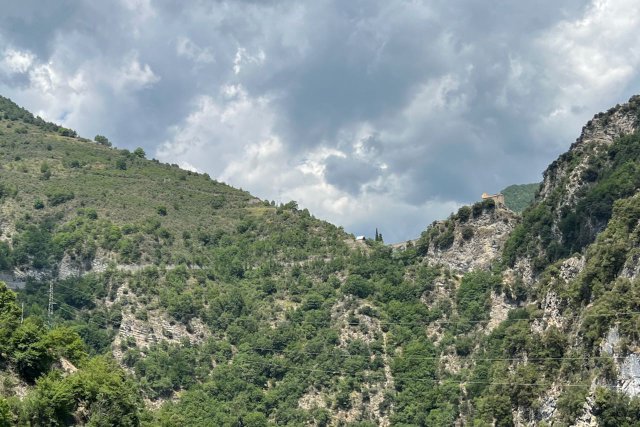 Distant view of the Notre Dame de la Menour from the gorge