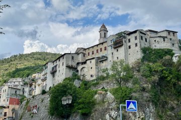 I won't forget that couple who applauded me through here Looking back at the town of L'Escarène, France