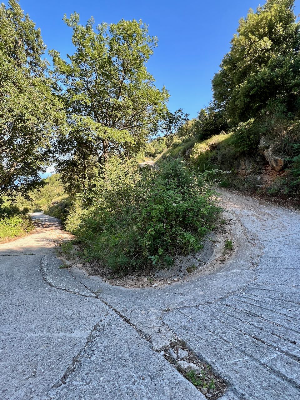 Switchback of semi-paved section of trail along the Col du Mont Gros near Menton, France
