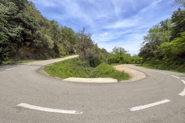 180 degree bend in the road down from Sant Marti de Sacalm.