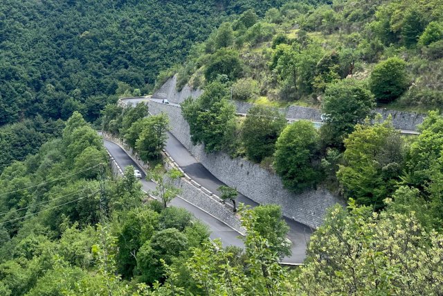 View out over some lacets or switchback roads on the Col de Turini