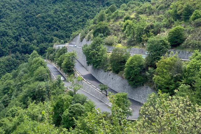 View out over some lacets or switchback roads on the Col de Turini