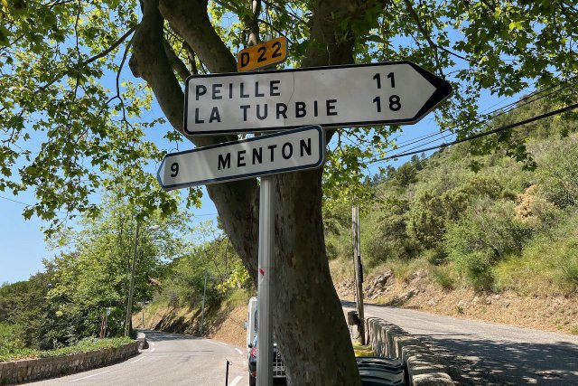 Traffic sign at a junction of the D22 at Sainte Agnès, France