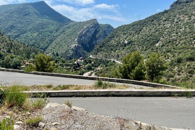 View out over several switchbacks along the Col de Braus climb in France