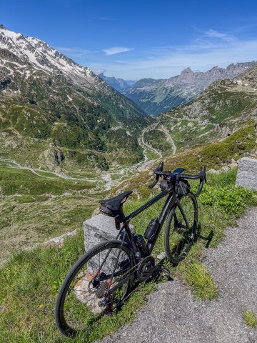 The views descending down the other side were just stunning, stunning, stunning. View from close to the top of the Sustenpass in Switzerland with bicycle in foreground.
