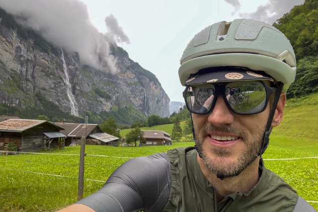 Selfie portrait of a cyclist in Lauterbrunnen with rain on helmet