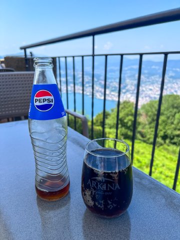 This tasted really good that day. Pepsi drink on table at the Ristorante panoramico Vetta Monte Brè at the top of Monte Brè