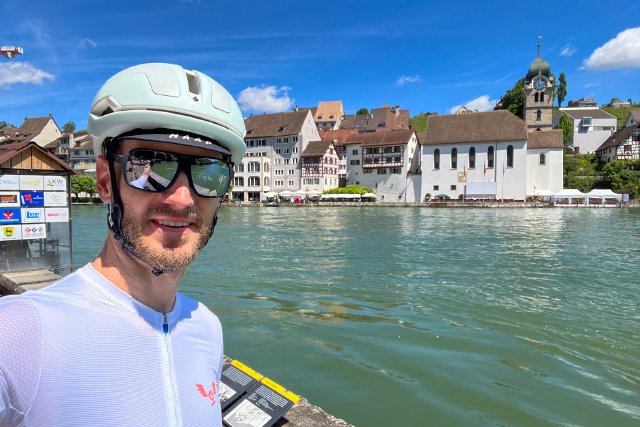 Cyclist selfie in front of the Rhine river in Eglisau, Switzerland near Germany