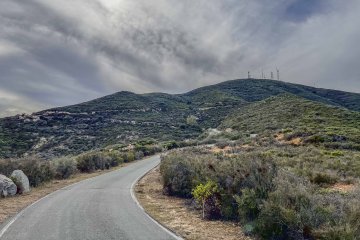 Steep paved road on the way up to the radio towers on top of San Miguel Mountain in San Diego