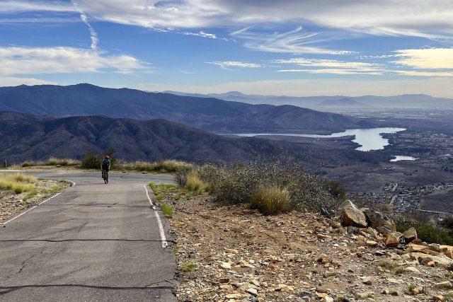 Cyclist climbing the final pitch to the radio towers on San Miguel Mountain