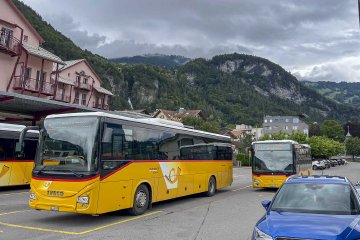 Bus at the Meiringen bus stationi before leaving for Andermatt