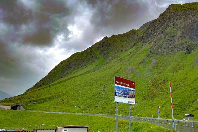 Sign welcoming visitors the Lukmanierpass in Switzerland