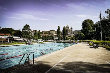 Totally free. And awesome. One of the many pools in Bern available to tourists and residents alike, called the Freibad Marzili.