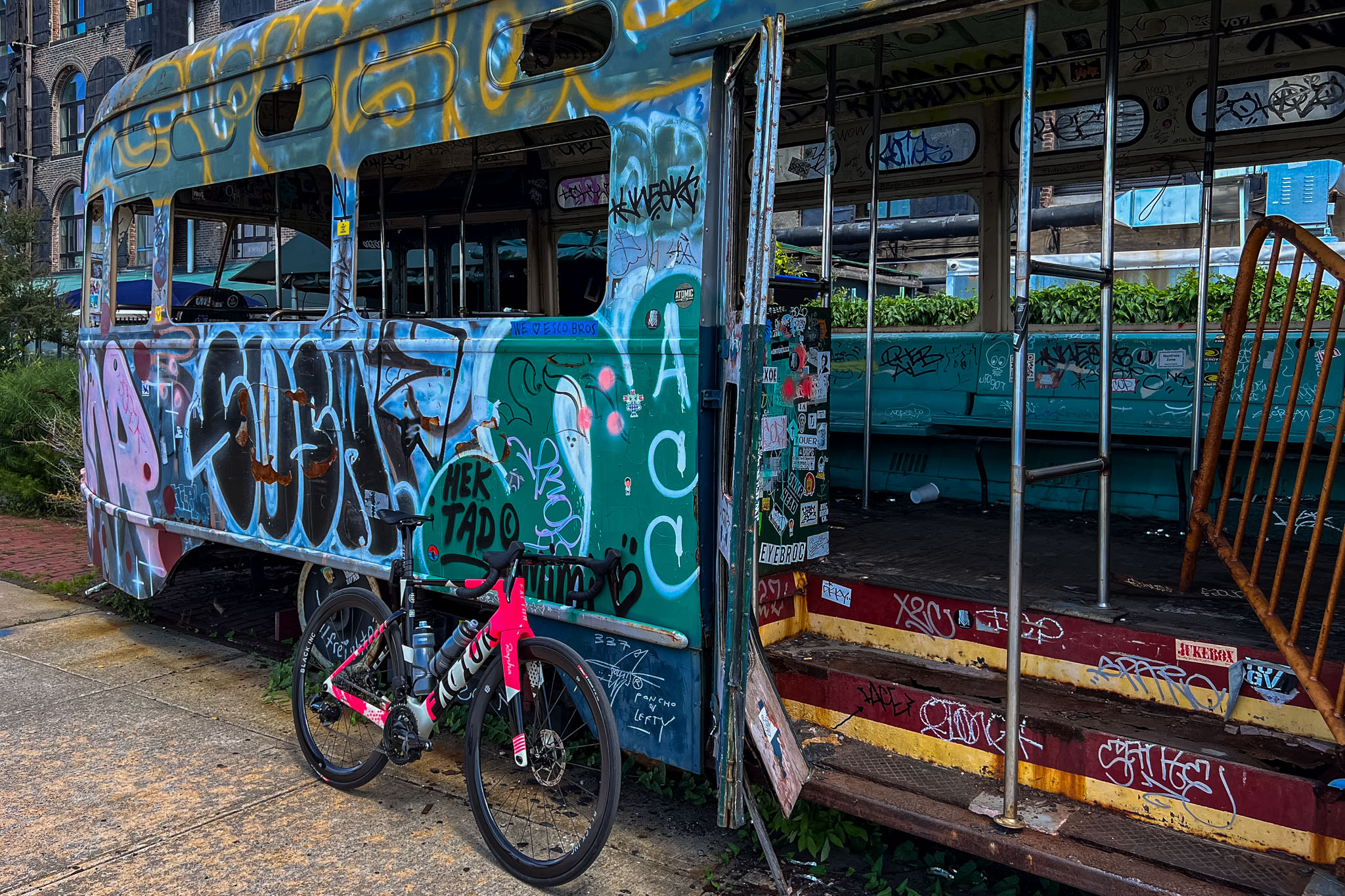 Factor Monza bicycle in front of an old train car covered in graffiti near Red Hook in Brooklyn, NY.