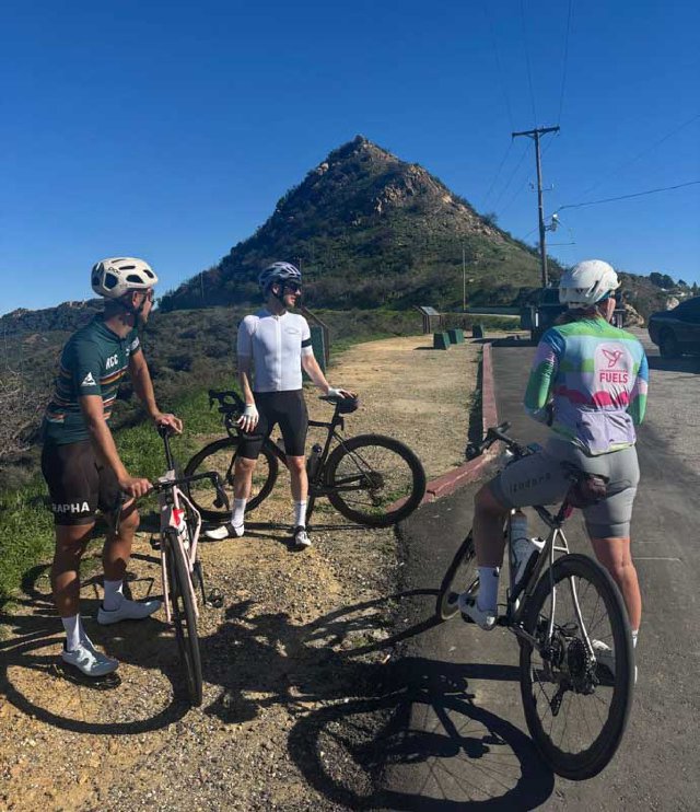 Cyclists resting at the top of Stunt road in the Santa Monica mountains.